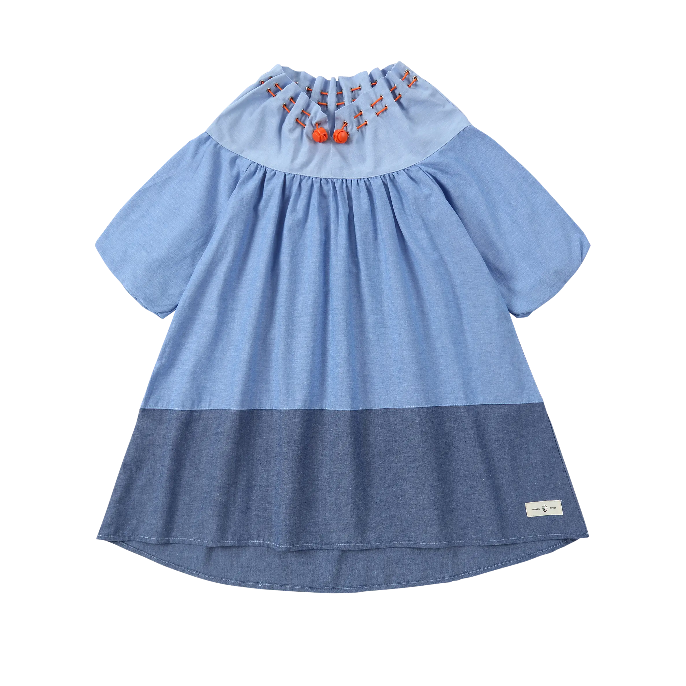 Puvu Pior® light blue chambray colorblock dress with gathered drawstring collar, orange toggles, and short sleeves.