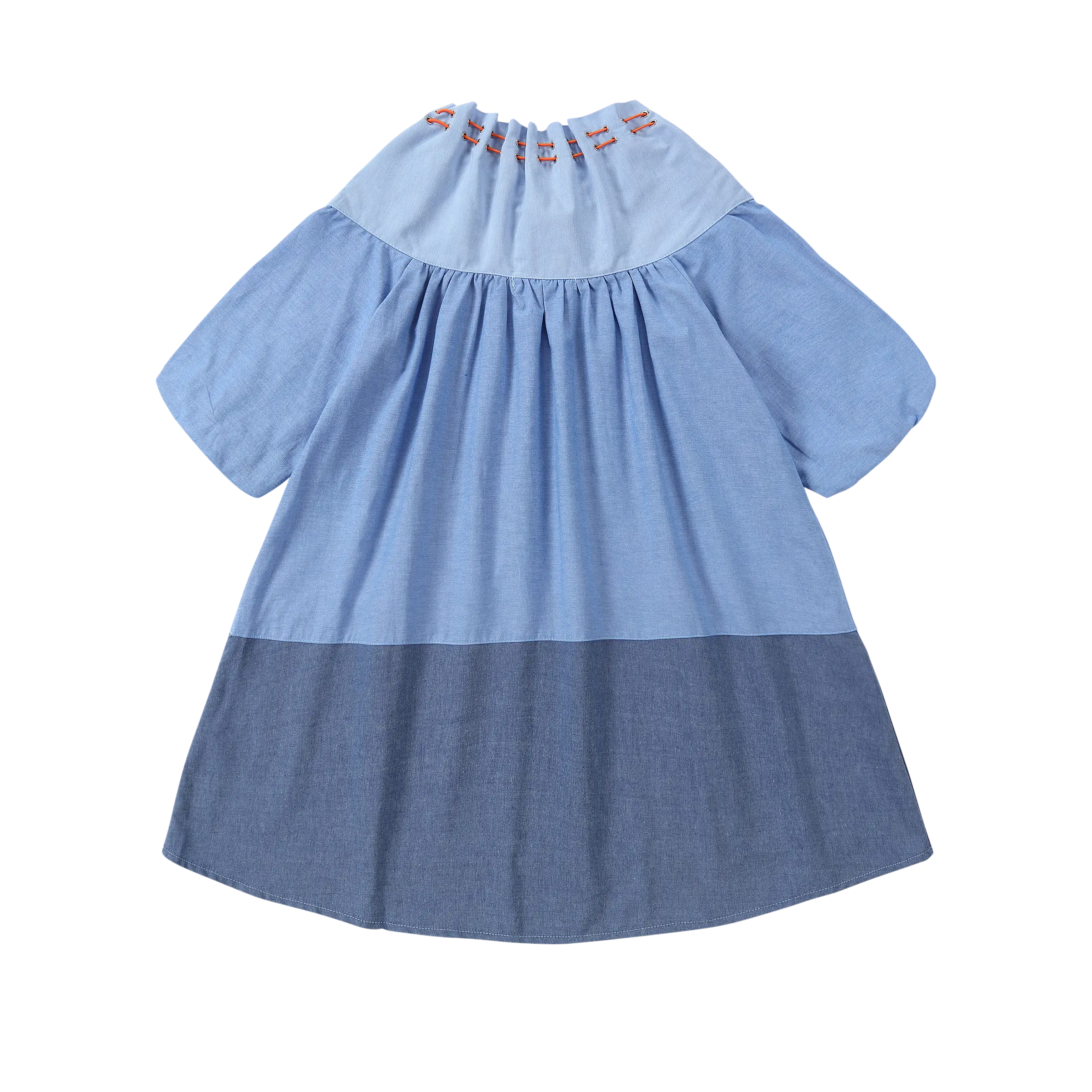 Back view of Puvu Pior® light chambray dress, showcasing the gathered collar, two-tone blue colorblock, and high-low hem.